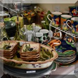 K09. Mugs, plates and cookware.
